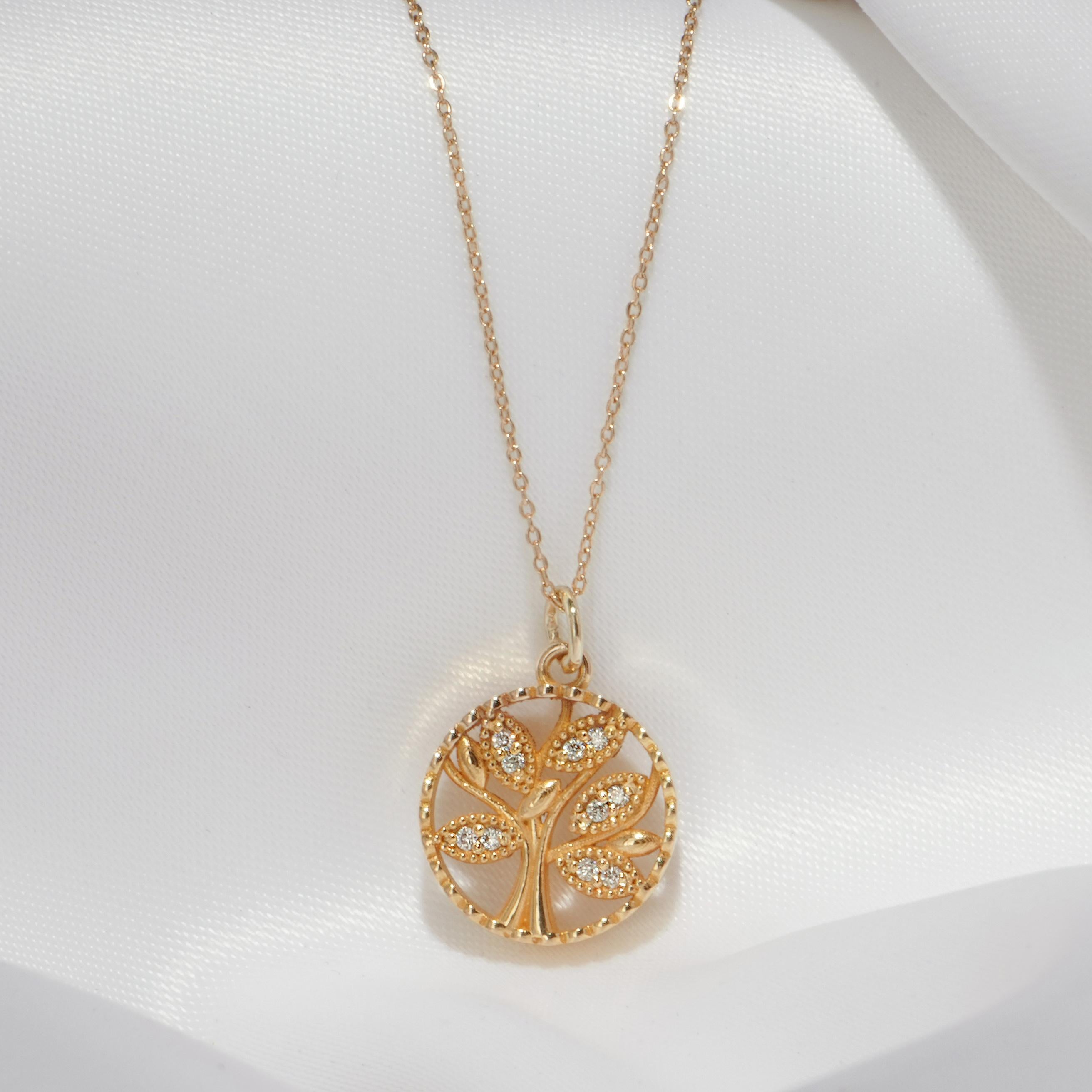 Do you love the symbol of life, growth, and connection? Do you want to own a pendant that is elegant, durable, and affordable? If so, you will love the 18k Solid Gold Tree of Life Pendant!

This pendant is made of 18k solid gold and features a