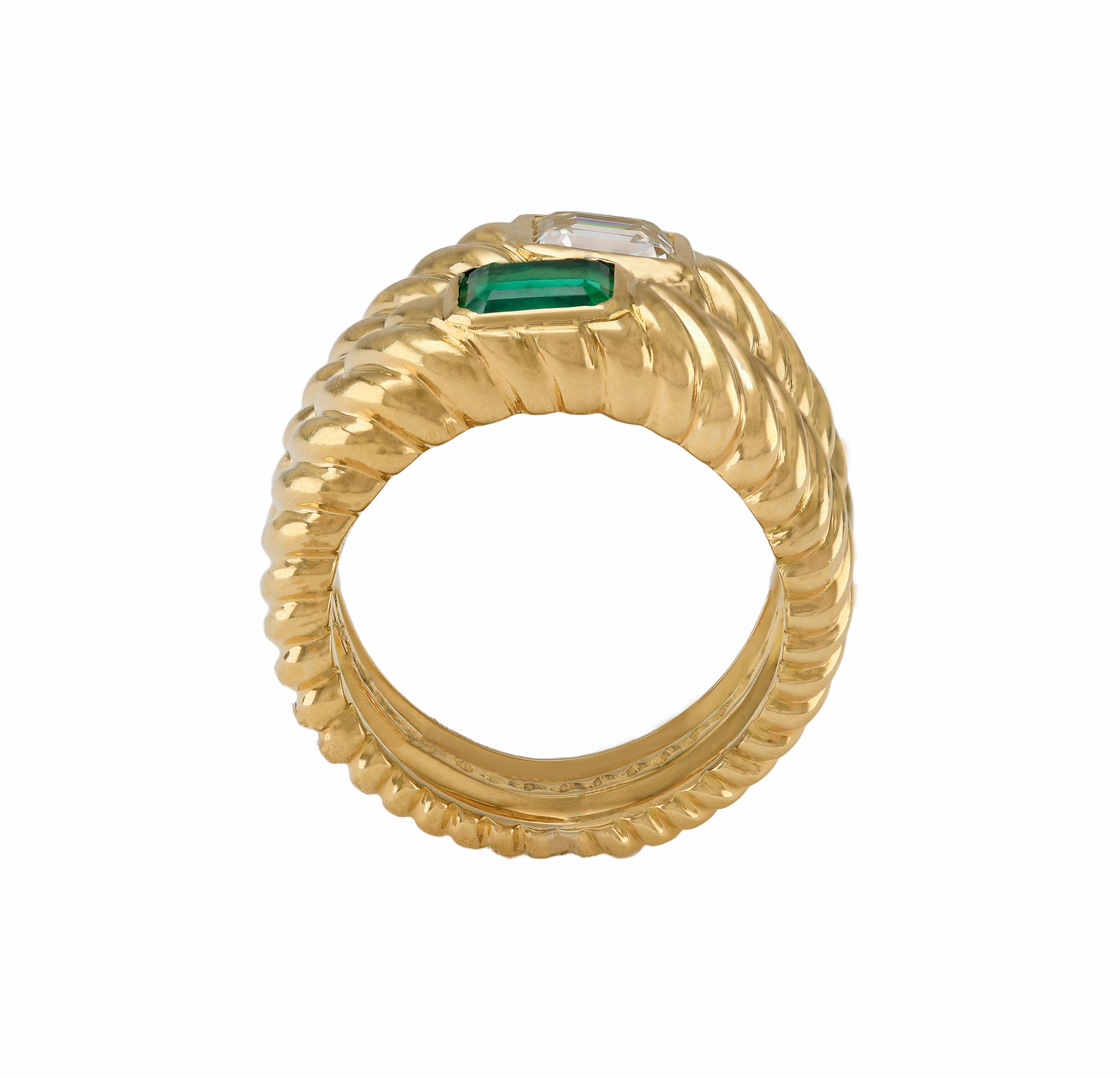 18k Solid “Toi et Moi” Emerald Cut 1.00ct Diamond Columbian Emerald Twin Ring
Beautiful very heavy Antique 1960’s Twin ring. Handcrafted with 15.0 grams of solid 18k gold, the ring exhibits the “toi et moi” ensemble, In French meaning “you and me”.