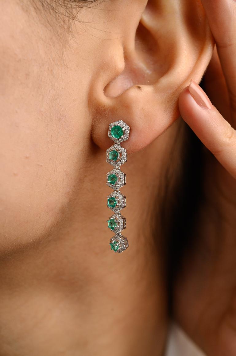 Genuine Emerald Diamond Long Dangle Earrings in 18K Gold to make a statement with your look. These earrings create a sparkling, luxurious look featuring round cut gemstone.
Emerald enhances the intellectual capacity.
Designed with emeralds, each