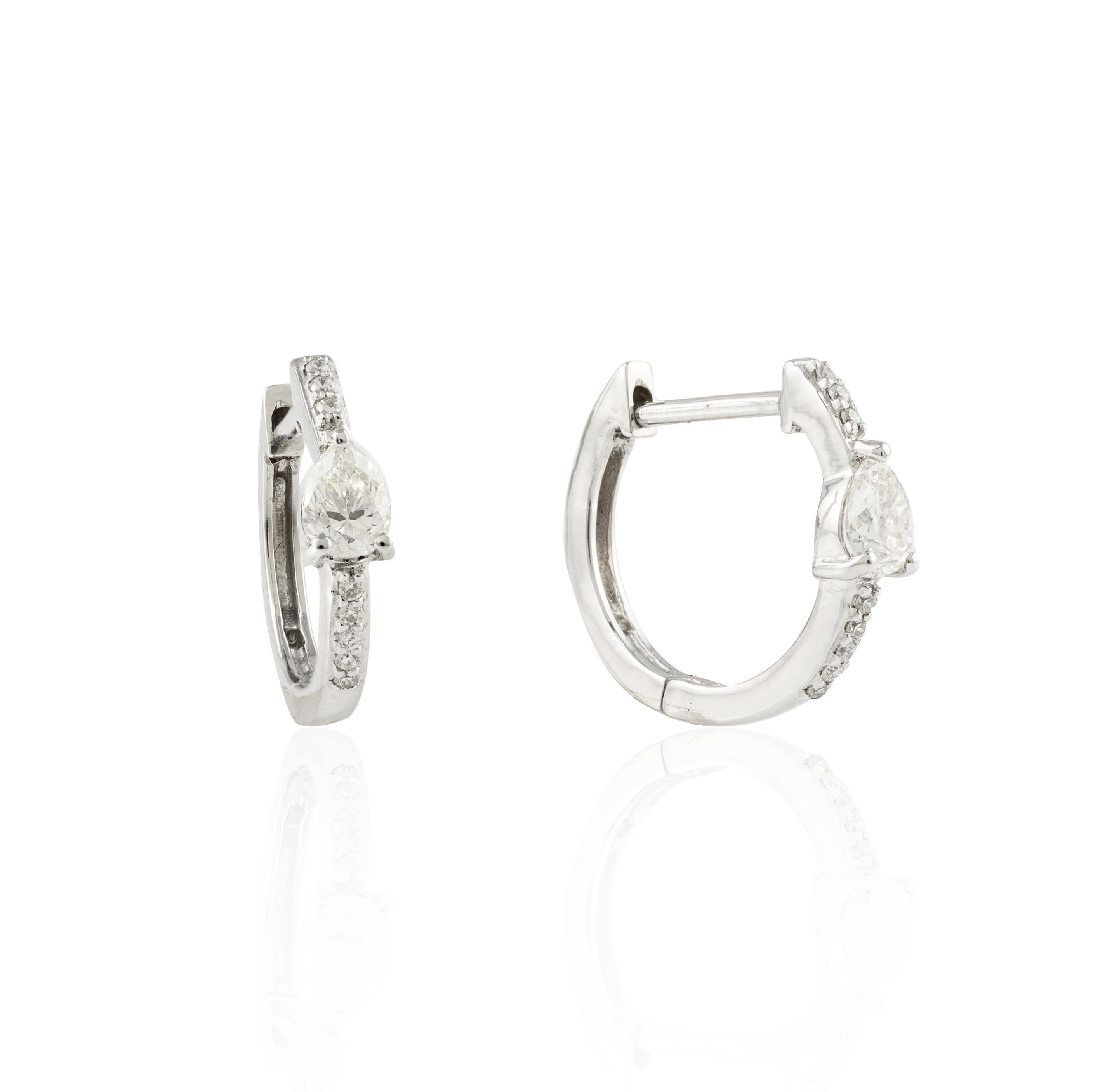Modernist 18k Solid White Gold Tiny Diamond Huggie Earrings with Pear Diamond in Center For Sale