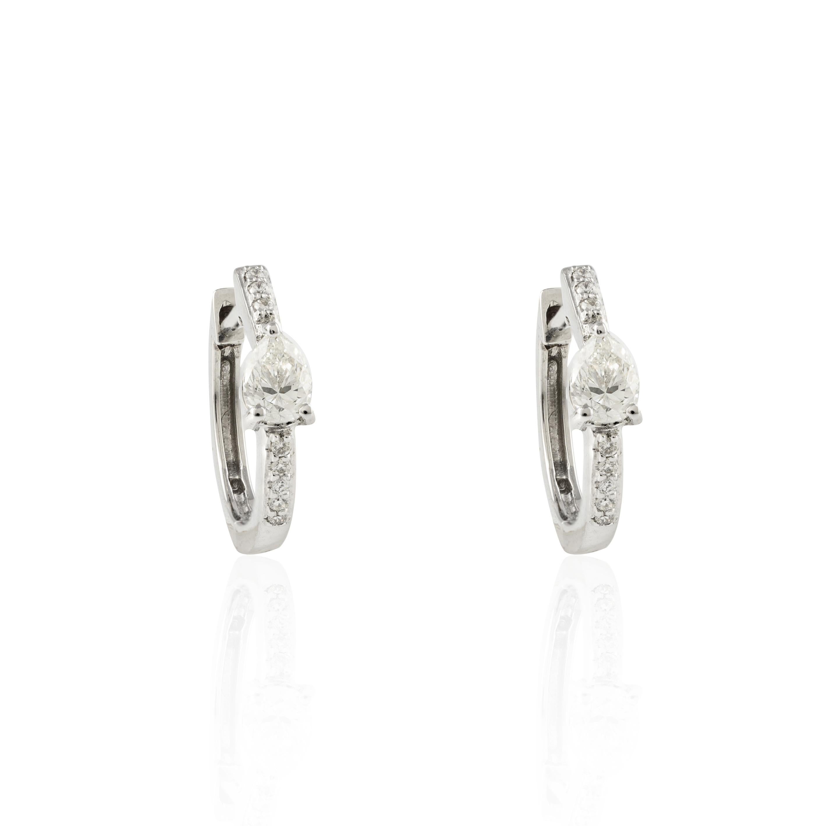 18k Solid White Gold Tiny Diamond Huggie Earrings with Pear Diamond in Center In New Condition For Sale In Houston, TX