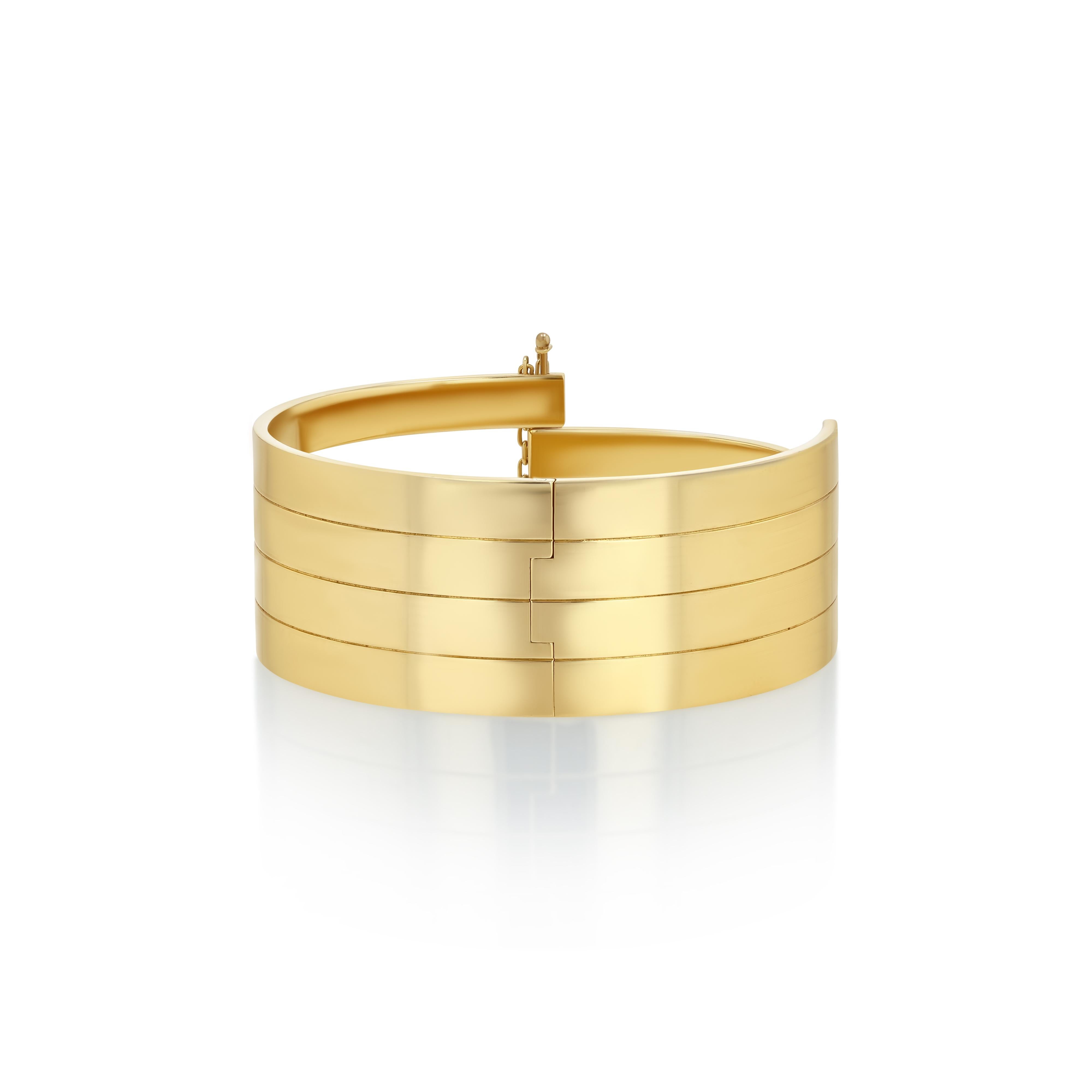 The Marguerite Cuff: Sculptural and unapologetically bold, The Margueritte Cuff is crafted in solid 18K gold and inspired by the angular harmony of Art Deco design. A series of interlocking gold bands wrap the wrist in a dynamic composition of light