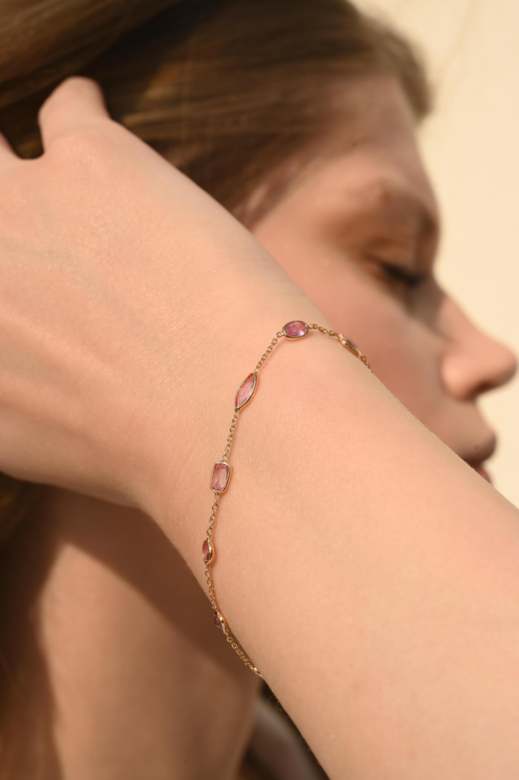 Minimalist pink sapphire layering bracelet in 18K gold. A gold gemstone bracelet is the ultimate statement piece for every stylish woman.
Adorn your wrist with this beautiful pink sapphire bracelet in 18 Karat Gold. Each piece is handmade with a