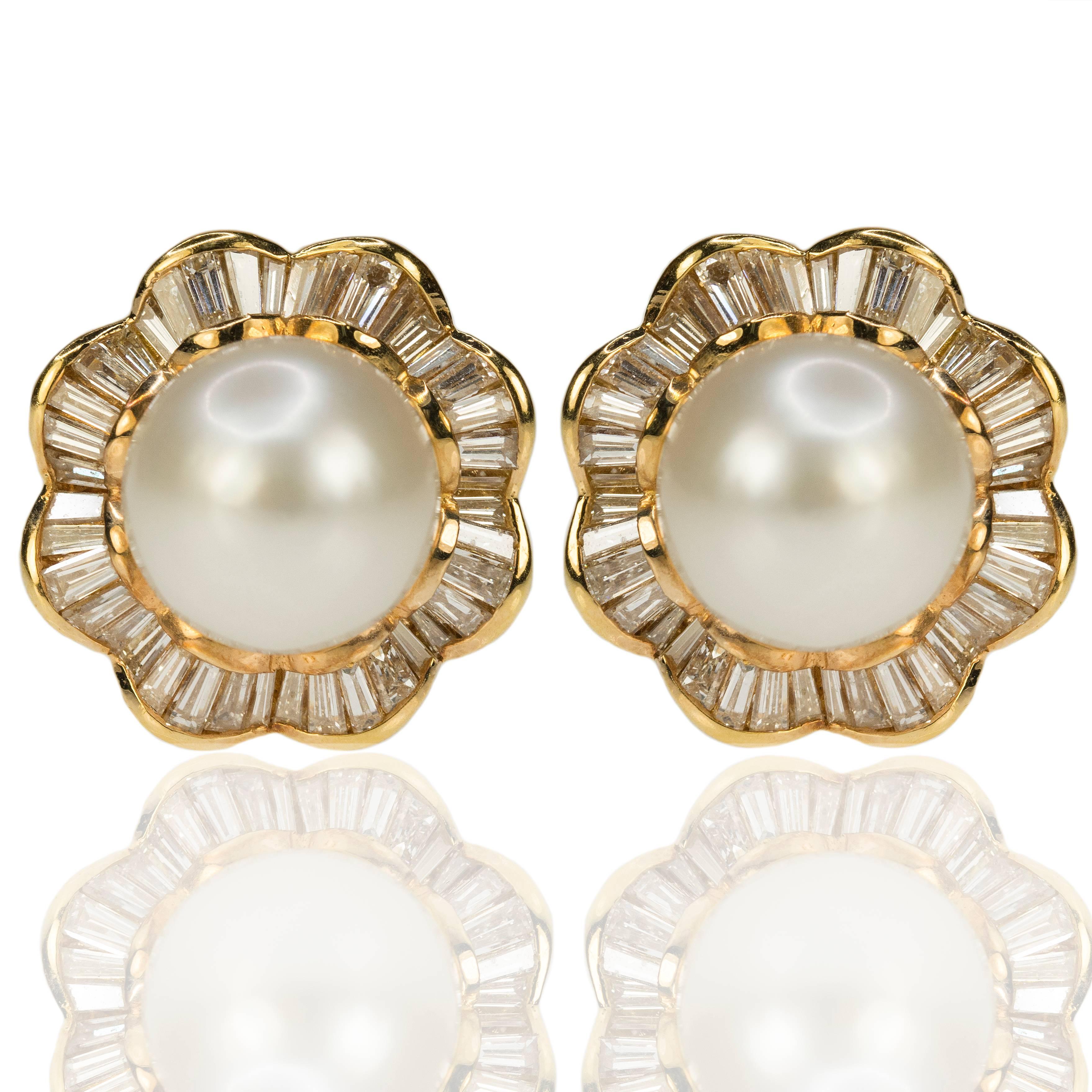 Very fine 18k South Sea Pearl Earrings containing two 12mm pearls and approximately 3.50 carats of diamonds