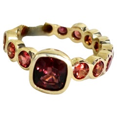 18k square Spinel ring with red sapphire eternity band