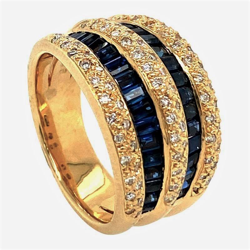 STYLE / REFERENCE: Classic Design
METAL / MATERIAL: 18 Karat Yellow Gold
CIRCA / YEAR: 1980's
STONES / WEIGHT: Fine Natural Blue Sapphires / 1.95cts Natural Diamonds 0.46cts
QUALITY: G/H Color VS/SI Clarity
SIZE:  6.75

This is a finely crafted