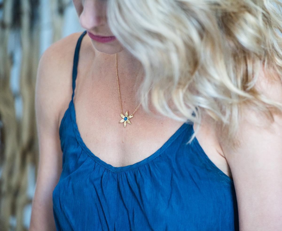 Artisan 18K Starflower Necklace With Blue Star Sapphire and Adjustable Chain For Sale