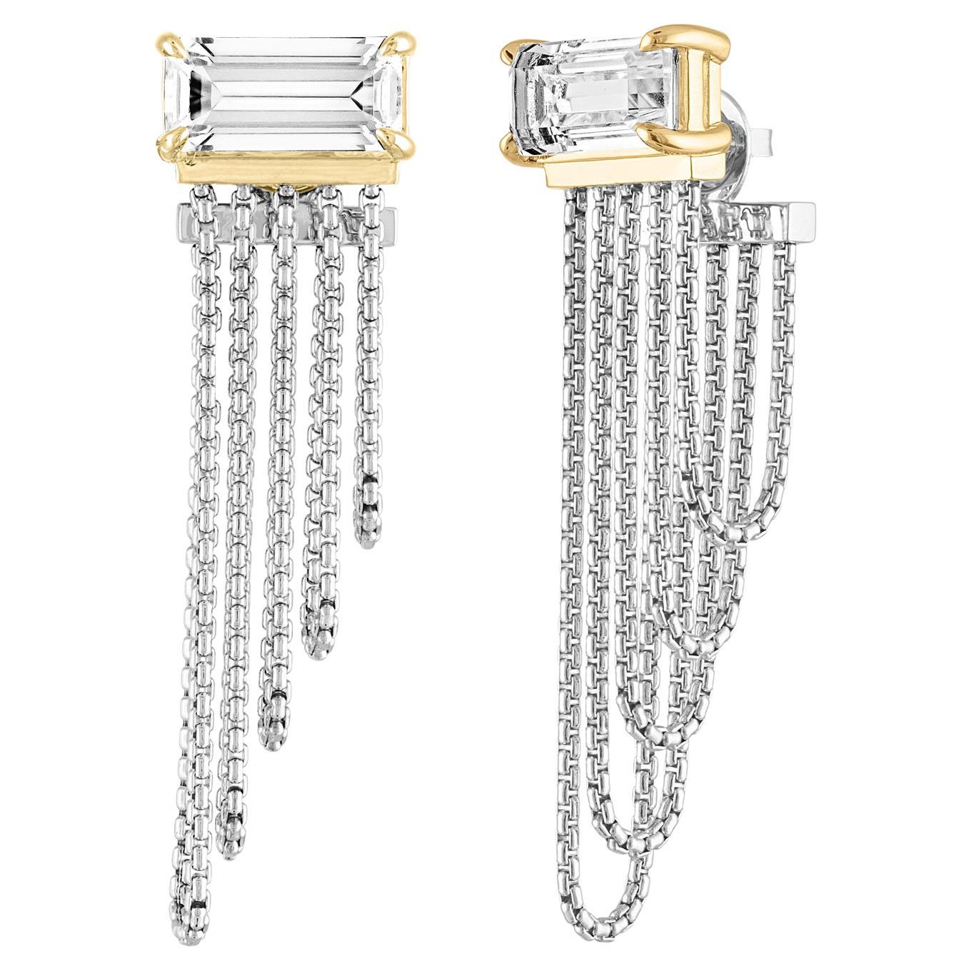 Light catching emerald cut rock crystals set in 18K gold sit atop looped lengths of sterling round box chain for a statement style that combines light, depth and movement. 18K posts and backings. Rock Crystals measure 15.4 X 7.4mm Made to order with