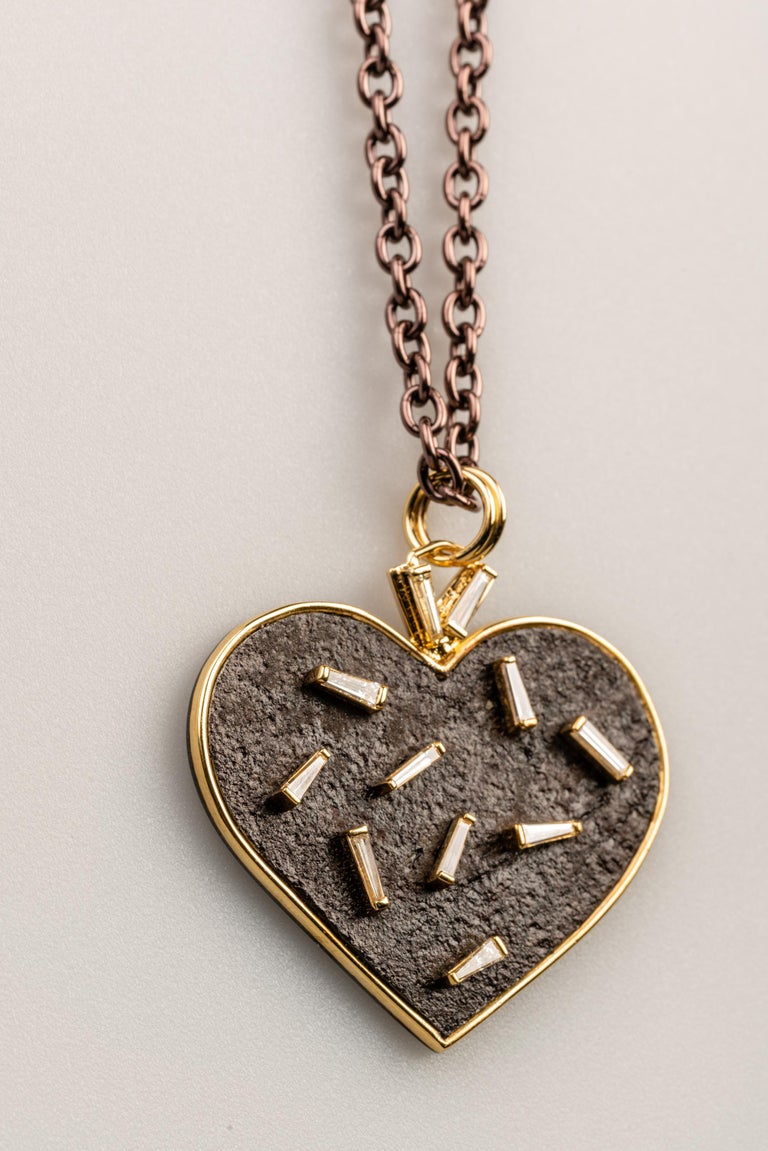 18 Karat, Sterling Silver, and Rusted Iron Heart Necklace with Baguette