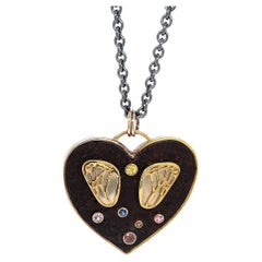 18k & Sterling Silver Wing Heart Pendant with Rusted Iron and Colored Gemstones