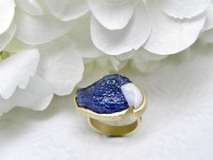 18k Tanzanite ring. Hand carved Parrot w Opal beak