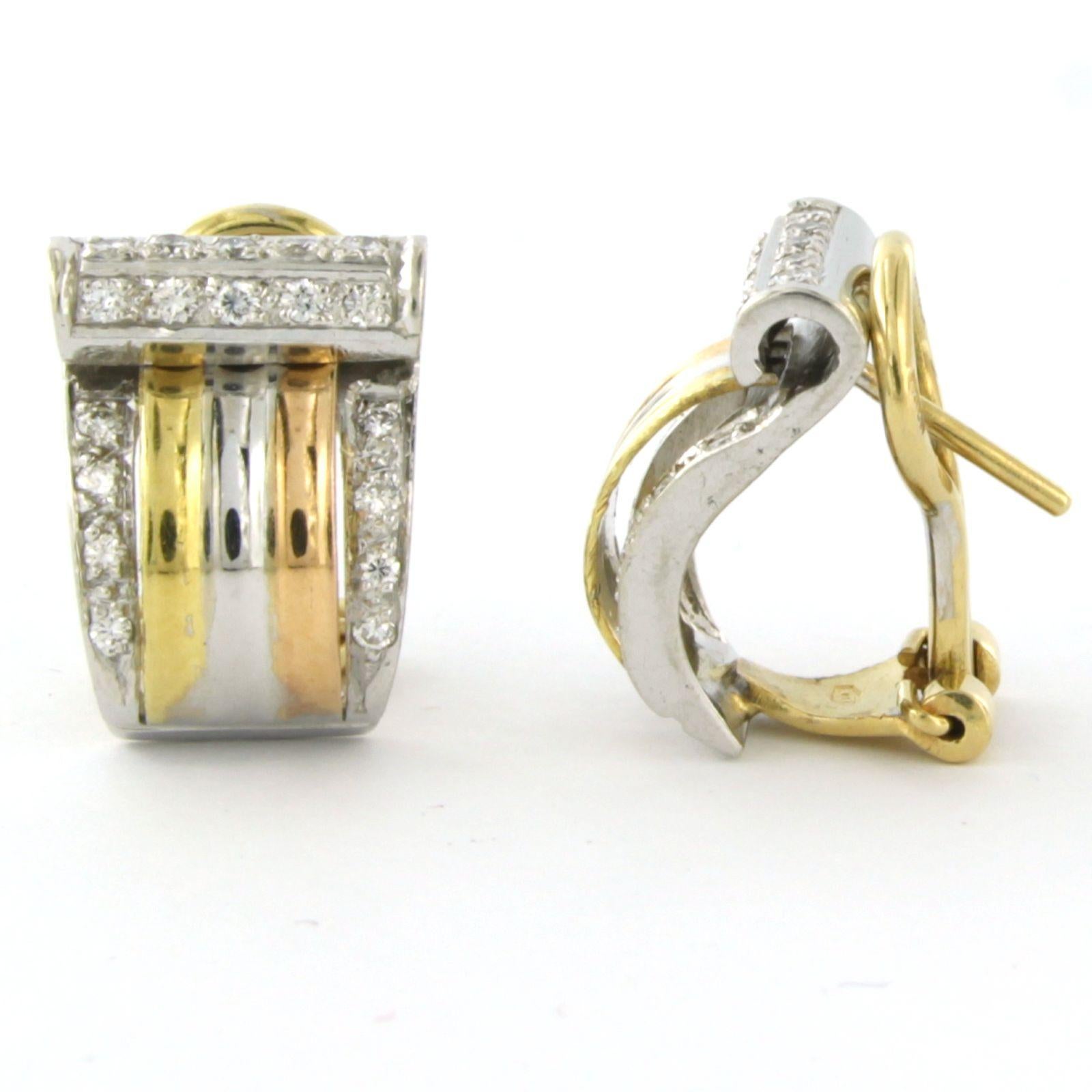 Modern 18k three-color gold ear clips set with brilliant cut diamonds up to. 0.40ct  For Sale