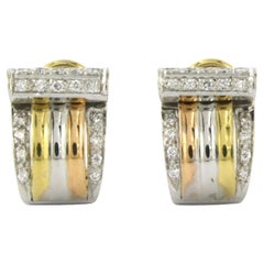 18k three-color gold ear clips set with brilliant cut diamonds up to. 0.40ct 