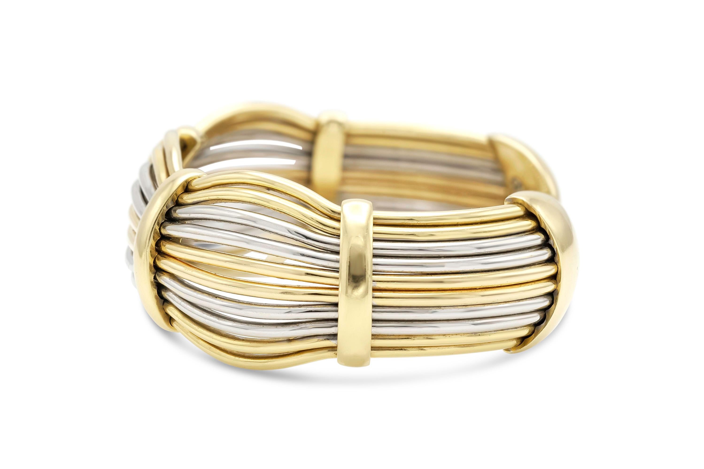 Finely crafted in 18k yellow, white, and rose gold.
Size 6 1/2
