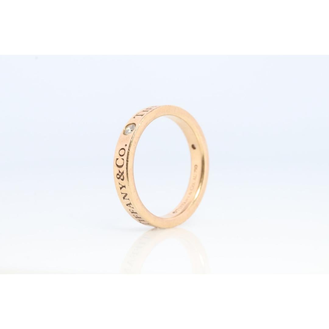 Round Cut 18k Tiffany and Co. band. 18k Tiffany Company Diamond wedding band. For Sale