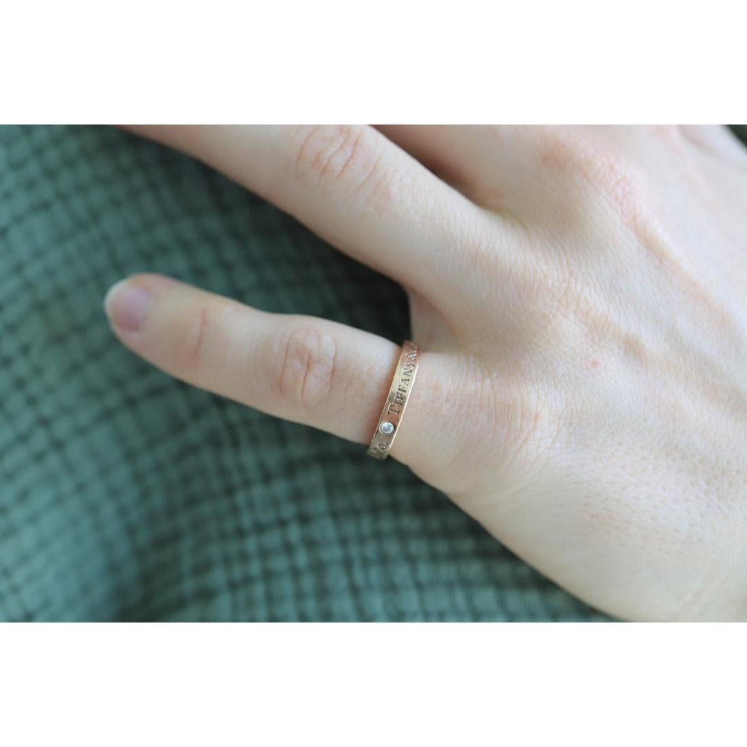 18k Tiffany and Co. band. 18k Tiffany Company Diamond wedding band. In Good Condition For Sale In Port Charlotte, FL