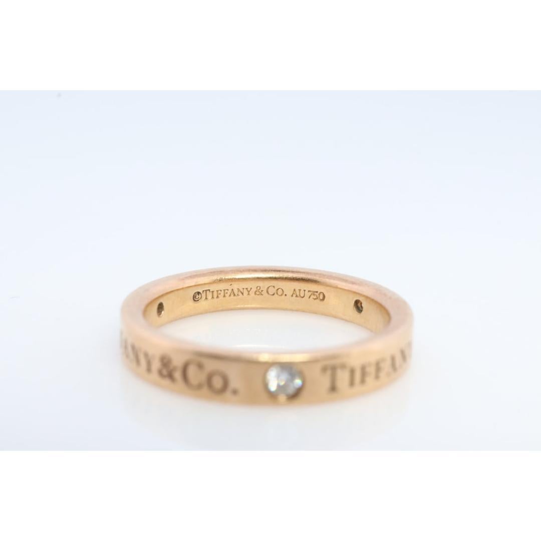 Women's 18k Tiffany and Co. band. 18k Tiffany Company Diamond wedding band. For Sale