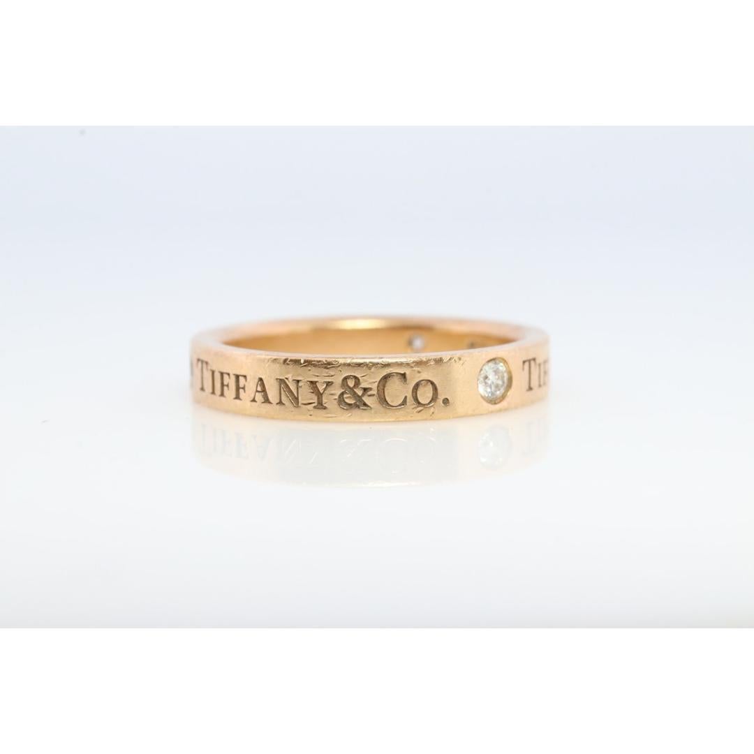 18k Tiffany and Co. band. 18k Tiffany Company Diamond wedding band. For Sale 2