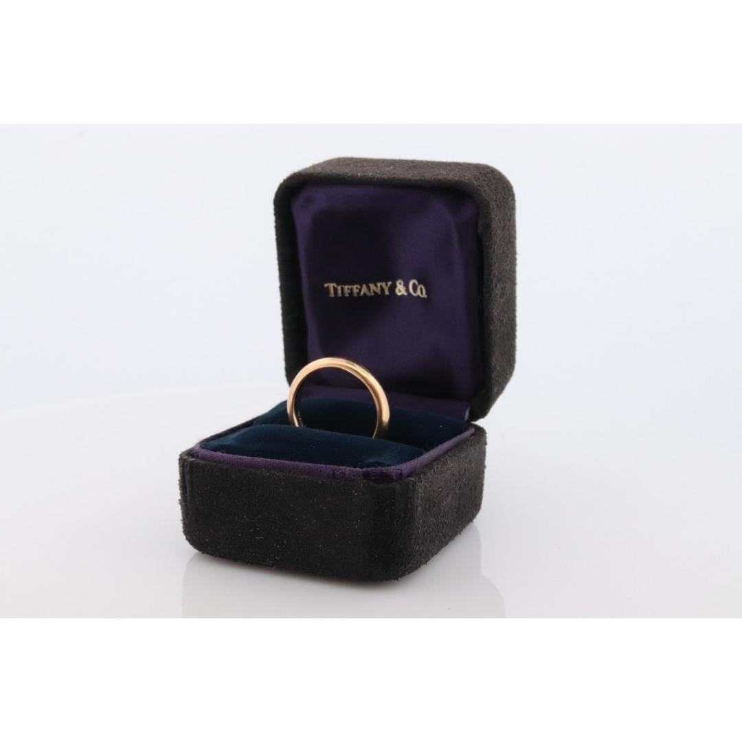 Vintage from the 1990s
Size: 5 1/2 US
Gemstone: Diamond
Gem color: Colorless

Band color: Gold

Tiffany and Co. 18k Gold band. Hallmarked Tiffany & Co. and 18k. Tests appropriately.

Do not let this one miss you by.

Condition: Has not been