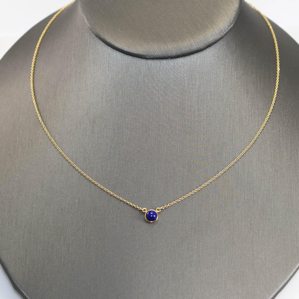 18k Yellow Gold Lapis Tiffany x Elsa Peretti Necklace.
From Color by the Yard Collection
Stamped Tiffany & Co, Peretti, and AU 750.
Weighs 2.4gr,
Necklace is 16in 