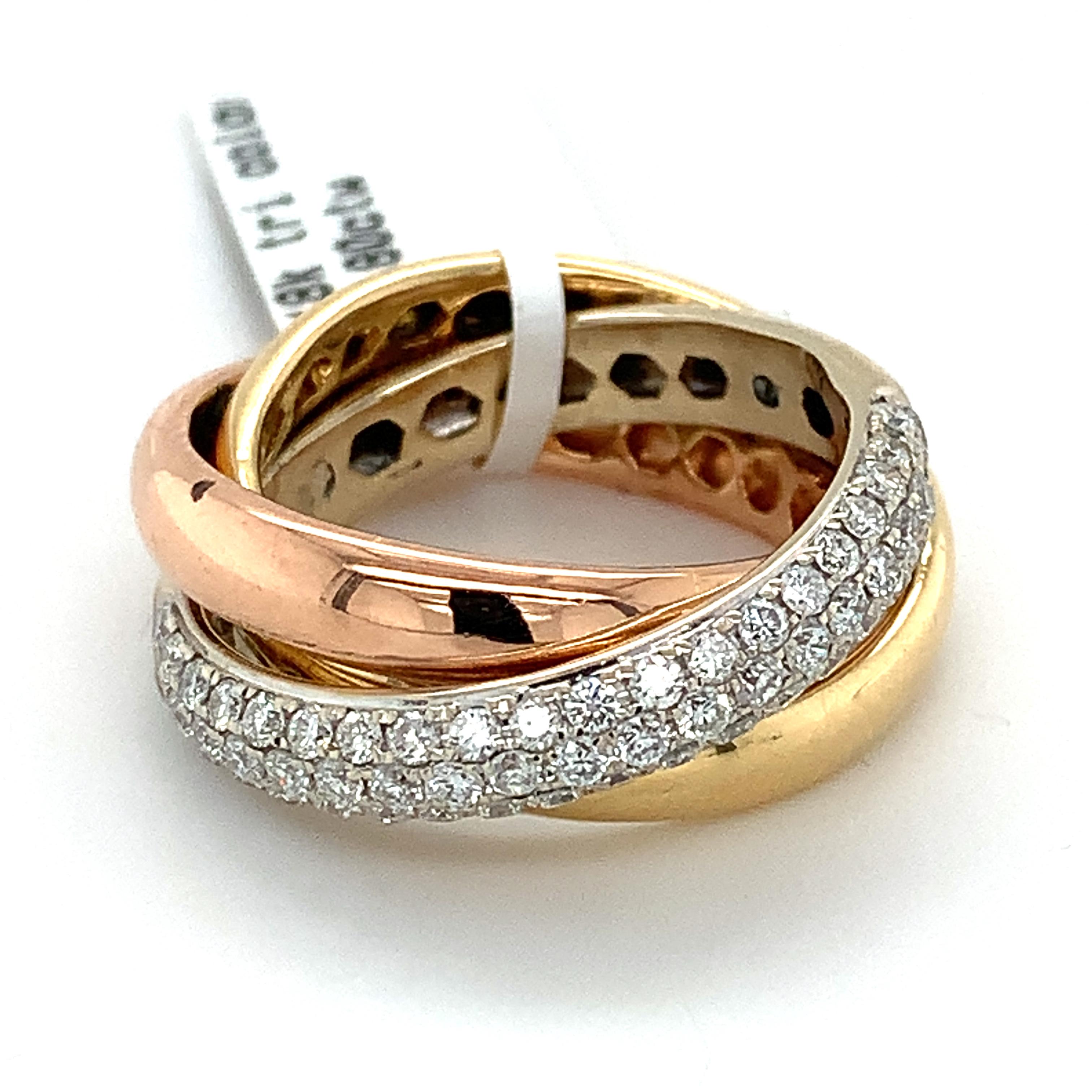 18k Rose White and Yellow Gold White Diamond Rolling Band Ring
Size 5
9.0 Grams
White Round Brilliant Cut Diamonds .8 Carats Total Weight
Color: F-G Clarity: VS-SI

this ring is a timeless tri color gold band. The rings don't actually roll. The