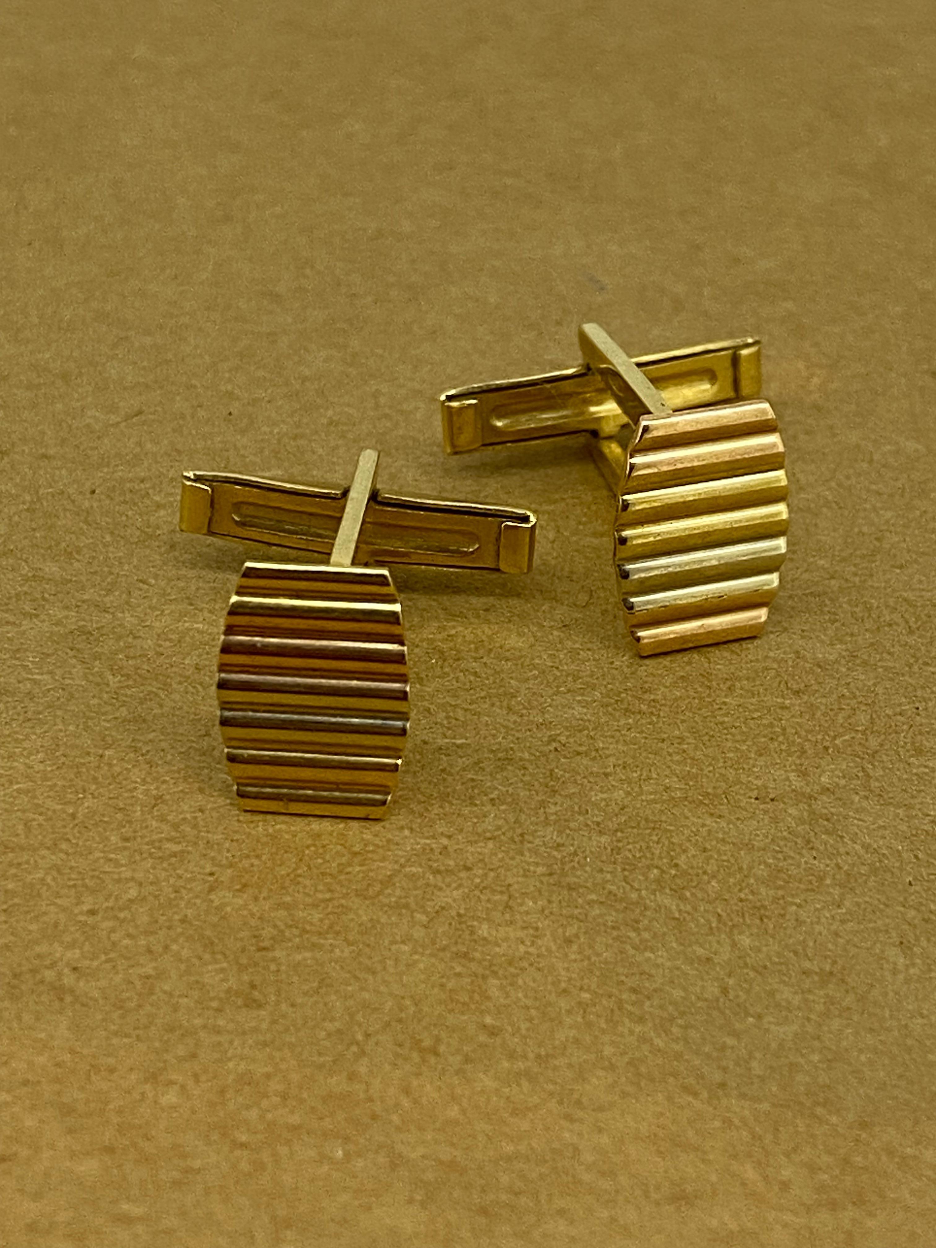 These exquisite Vintage Pair of Cufflinks

are crafted in 18K Tri-Colour Gold,

bearing Italian hallmarks & 750 stamp

 

Complete by bullet backs – with a bar attached to the bridge of the cufflinks, 

that rotates 90 degrees so that you can easily