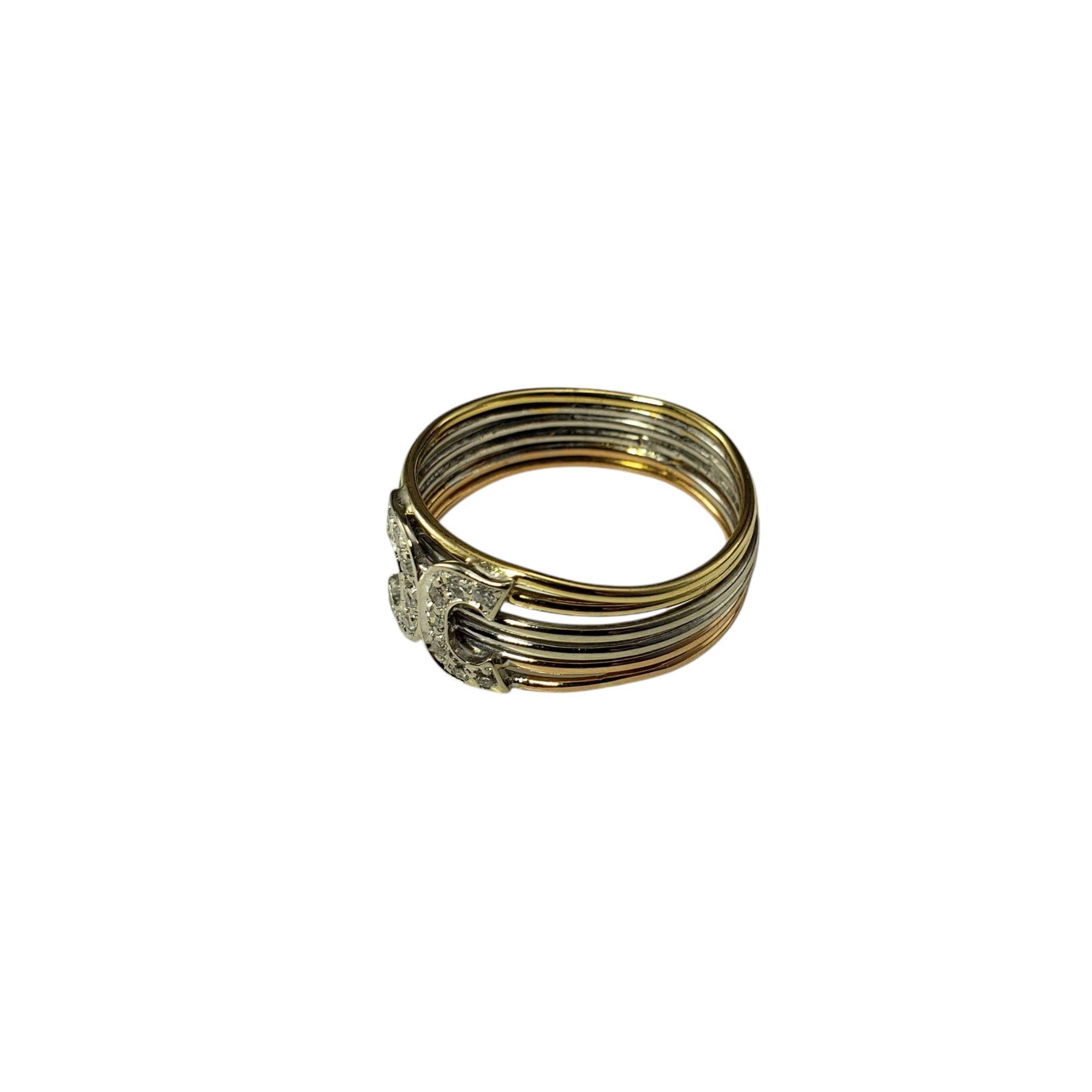 18K Tricolor Gold and Diamond Band Ring Size 6.75

This elegant multi-band ring is crafted in 18K yellow, rose and white gold and adorned with 14 round single cut diamonds*, adding a touch of sparkle to the piece. 

 Shank: 5.5 mm.

Front of ring