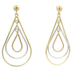 Boucles d'oreilles pendantes en or tricolore 18 ct.