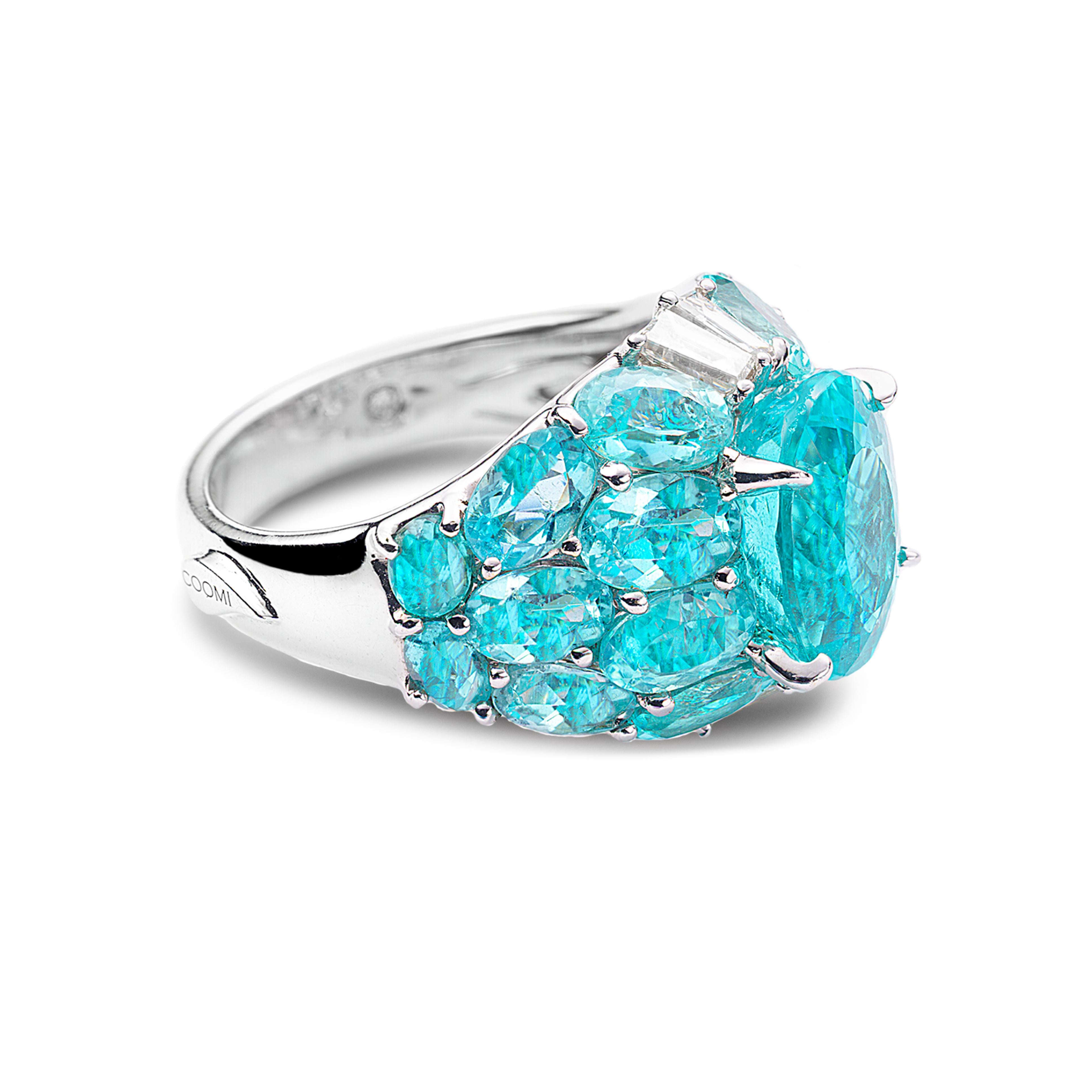One of a kind Paraiba ring with 6.58cts Paraiba center stone. 5.04cts of Paraiba pave, and 0.79cts of diamonds all set in 18kt white gold. 