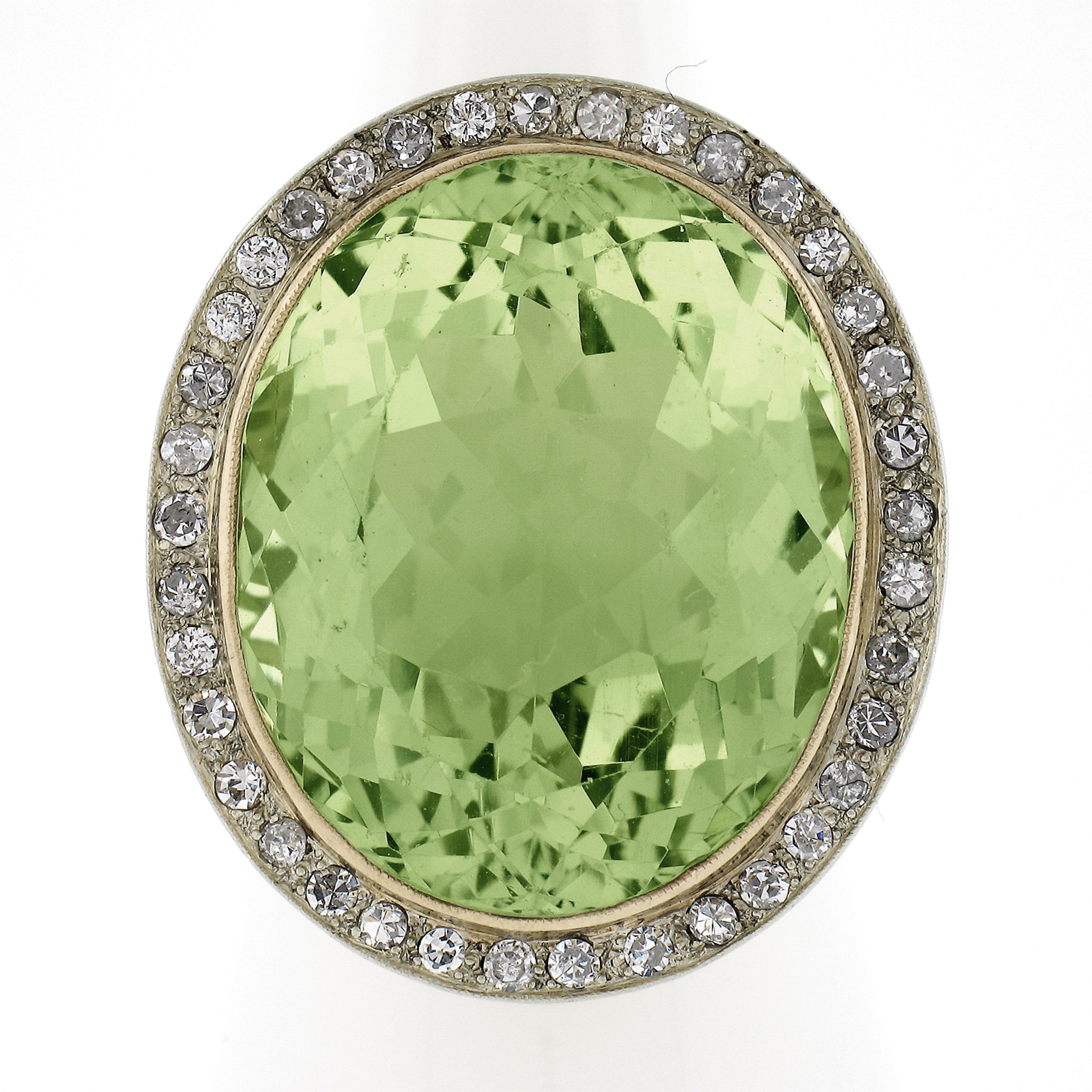 --Stone(s):--
(1) Natural Genuine Beryl - Oval Brilliant Cut - Bezel Set - Greenish Yellow Color - 40ctw (approx. based on the certification)
** See Certification Details Below for Complete Info **
(37) Natural Genuine Diamonds - Old Single Cut -