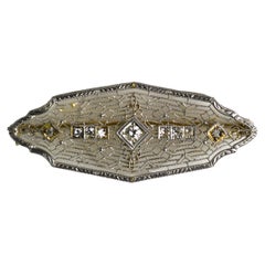 Spilla con diamante Art Deco bicolore 18K 0,30ct