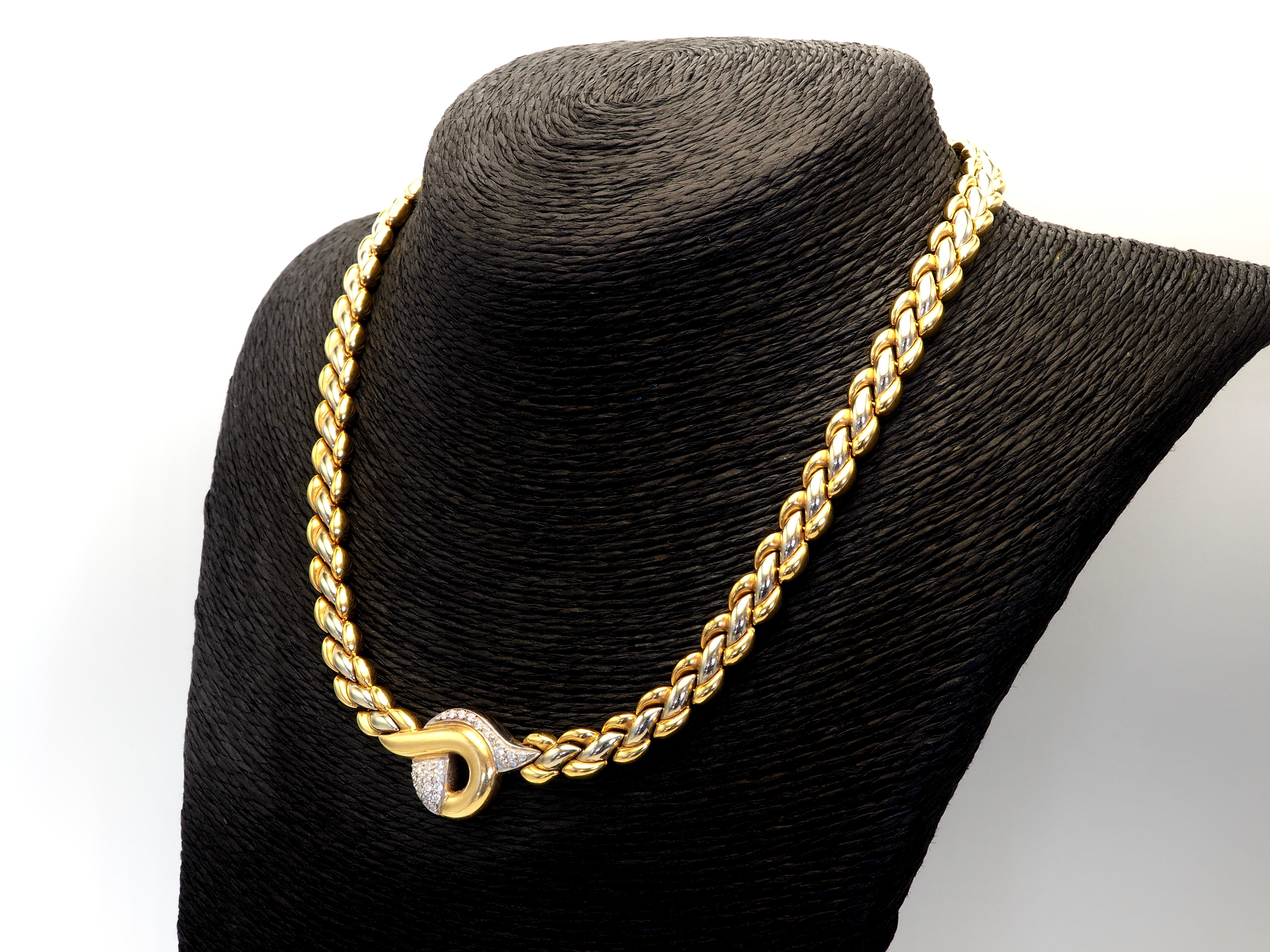Genuine Chimento woven necklace two toned 18k gold. In excellent condition.

Product Details:

Creator: Chimento
Metal: 18k Solid Gold
Metal Color: Yellow and White Gold
Total weight: 51.2 grams

Body Dimensions:
-Chain width: 0.32 inches (8 cm)