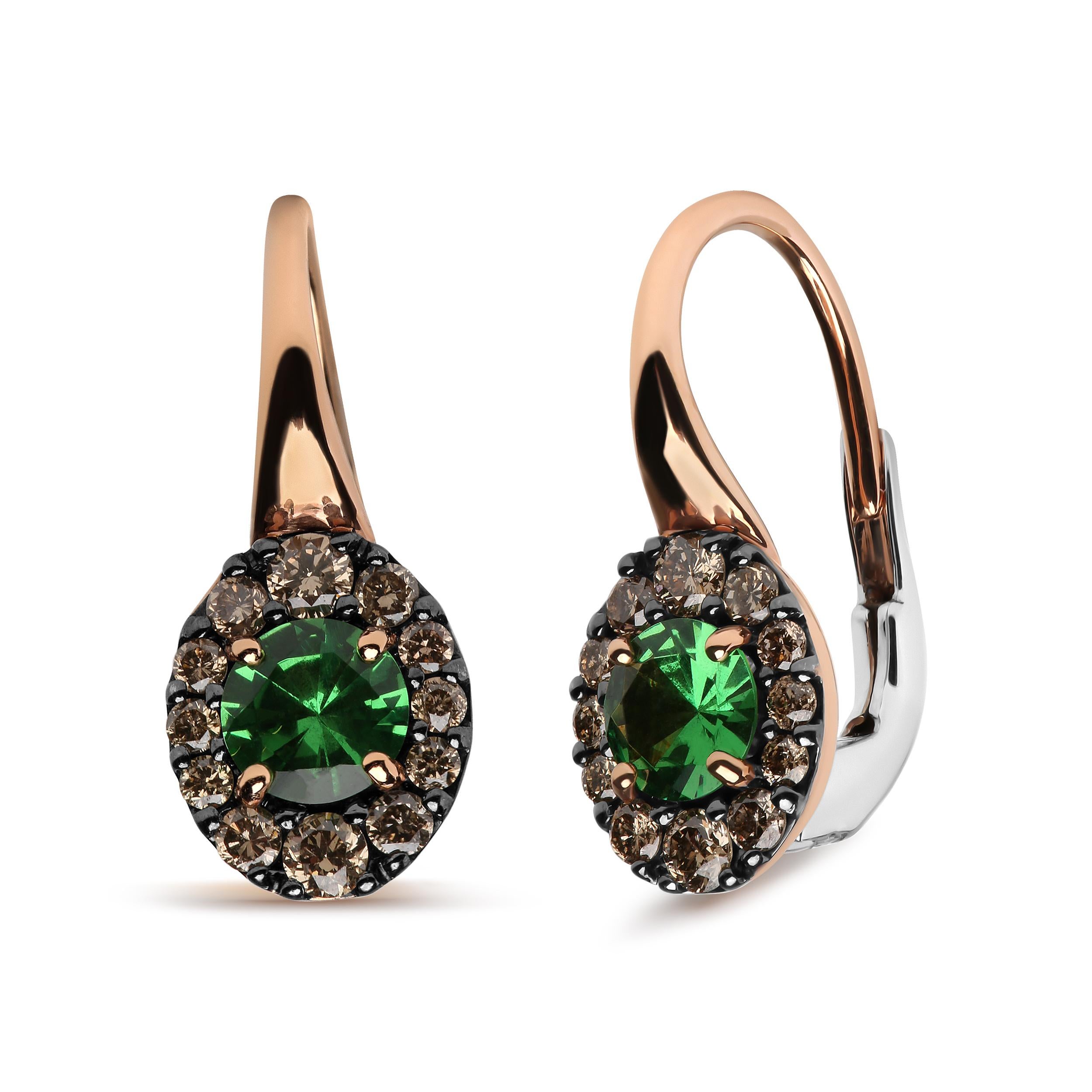 The striking beauty of natural gemstones is complemented by halos of diamonds in these sensational 18k rose and white gold drop hoop earrings. Nested within 4-prong settings in each earring are 4.5mm round heat-treated green tsavorite gemstones.