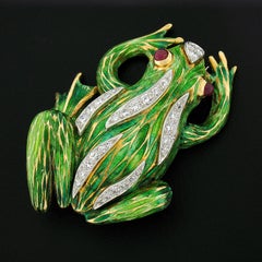 Spilla a rana in oro 18k bicolore con dettagli a mosaico in smalto verde con diamanti e rubini