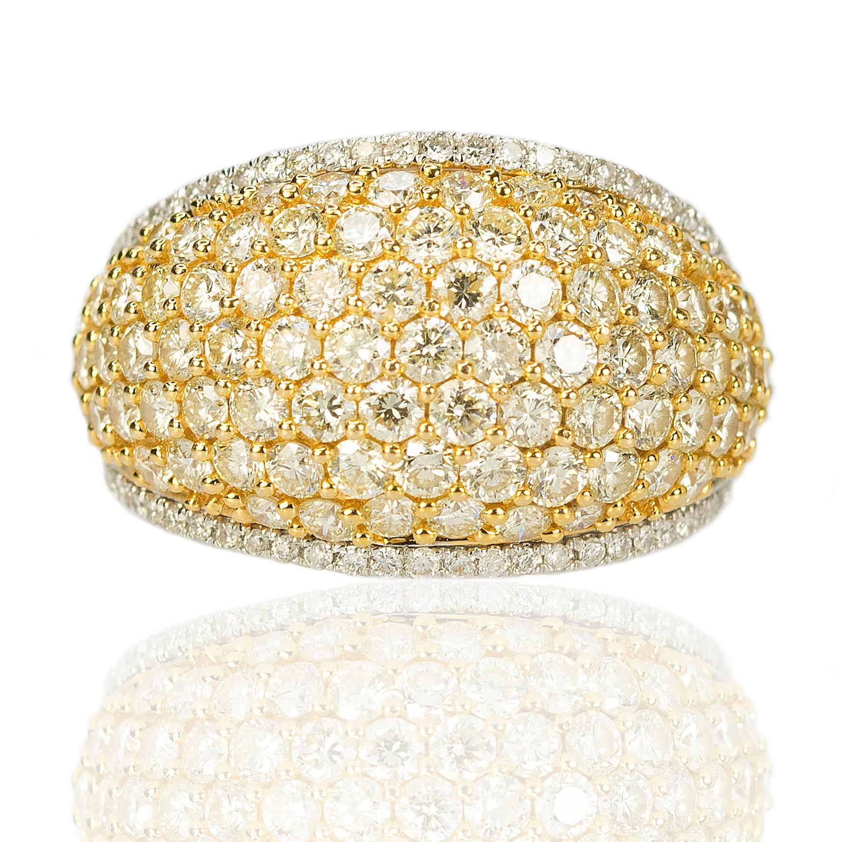 18k White and Yellow Gold Ring  with approximately 3.80 carats of collection color clarity ideal cut diamonds.  