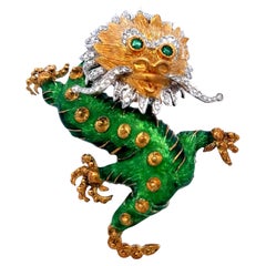 Spilla Drago in oro 18K bicolore con diamanti e occhi di smeraldo Vintage