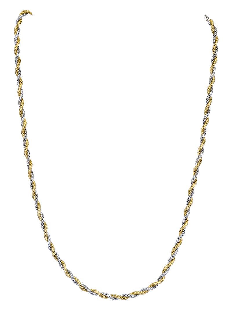 A beautiful and stylish necklace showcasing an intertwined rope chain design made in 18k yellow gold and white gold. 18 inch chain length. 
