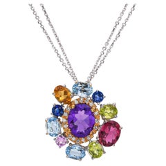 Collana con ciondolo in oro 18k bicolore con pietre e diamanti