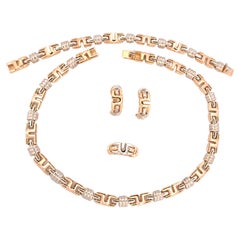 Suite di gioielli convertibili in oro 18K bicolore con collana, bracciale e anello