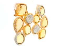 Orecchini pendenti flessibili in oro 18k bicolore con ritratto di citrino e diamante