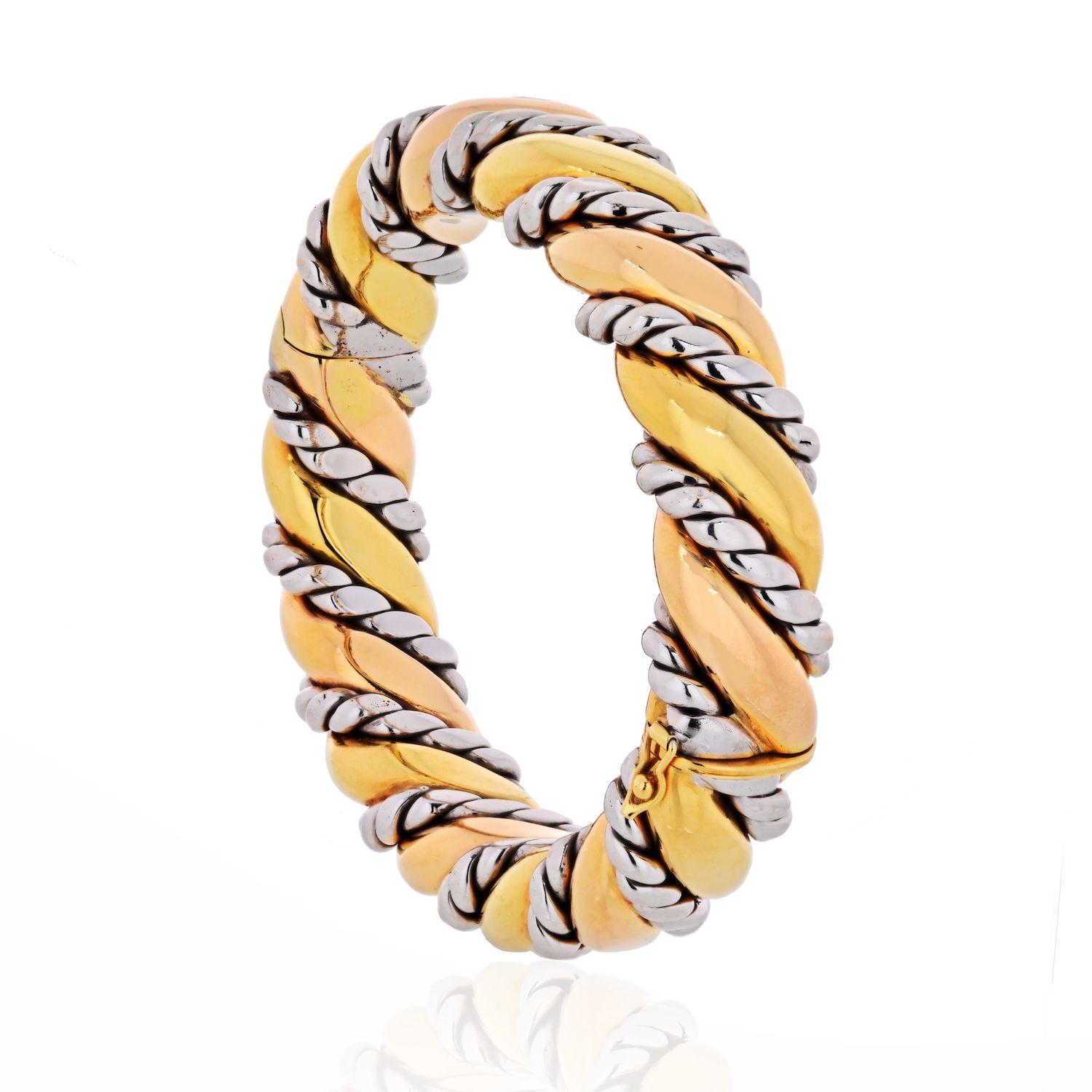 18K Two Tone Hinged & Textured Bangle Bracelet. 80gr. Fits a wrist that is 6.5 inches.

