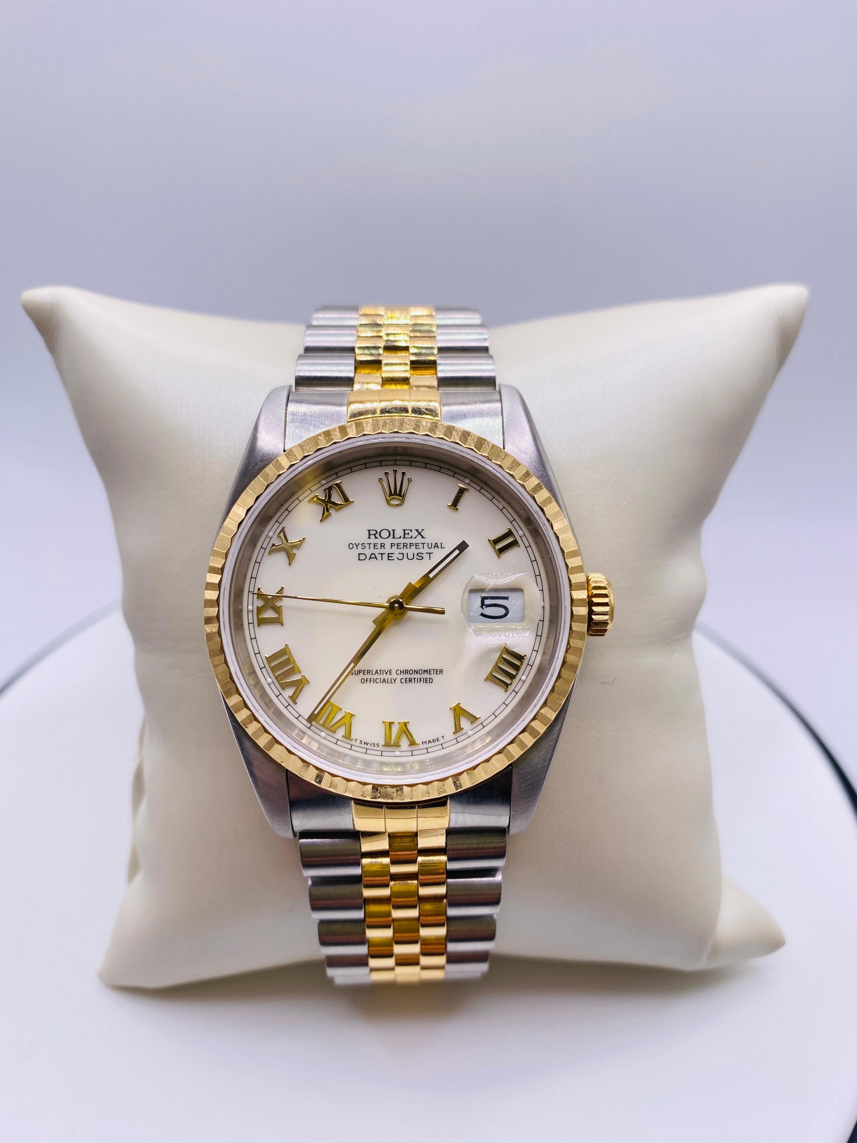 18k yellow gold and stainless steel two-tone Rolex DATEJUST oyster perpetual watch. Model number 16233. Serial number I663780. Circa 1990. Fully serviced. No visible modifications. 35mm case.