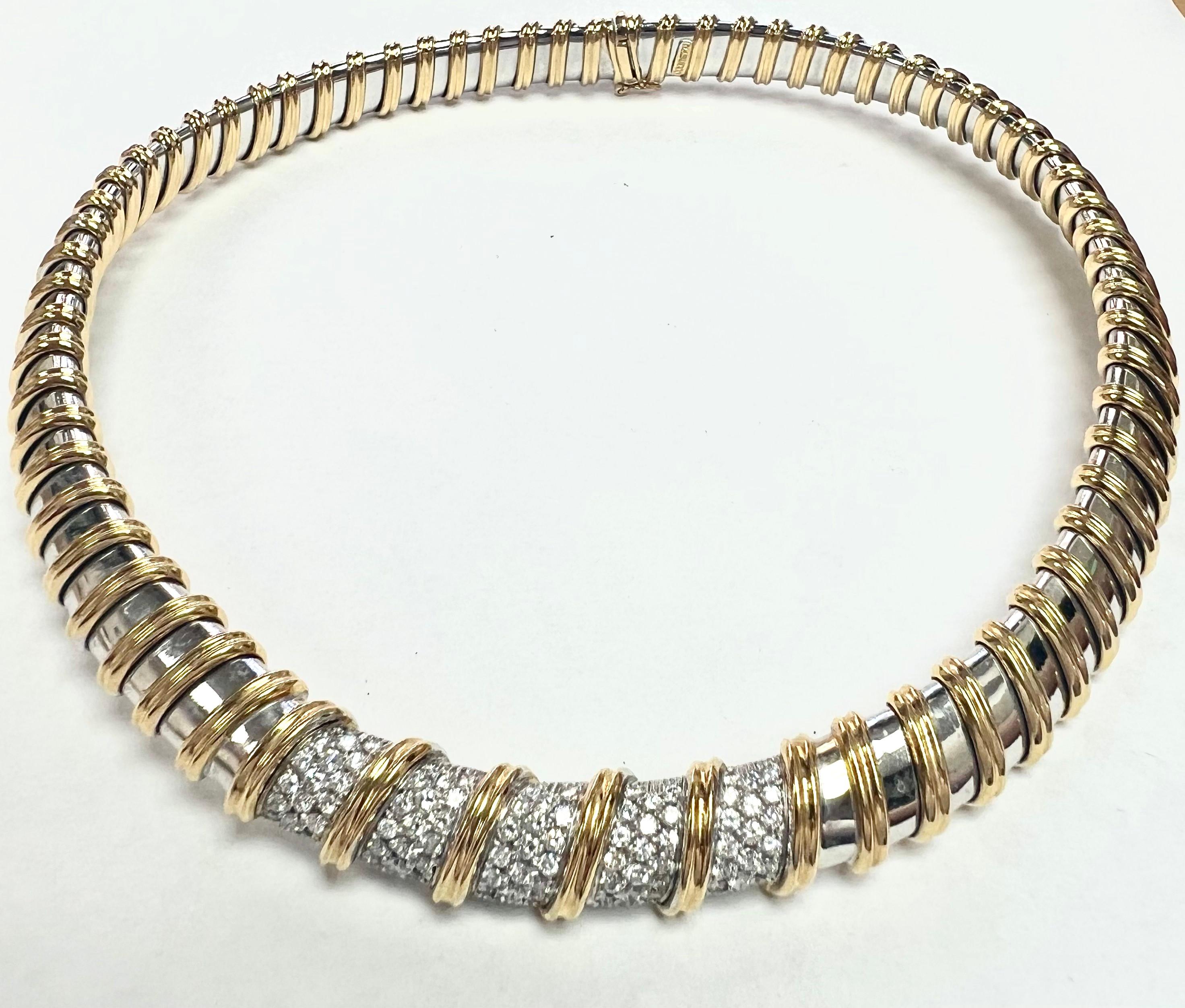 Showcasing a simply beautiful, elegant, and finely detailed two tone necklace, it features 5 beautifully set rows of natural white round diamonds, approx. 3.04 total carat weight. The necklace is hand crafted in 18k yellow & white gold. Ideally