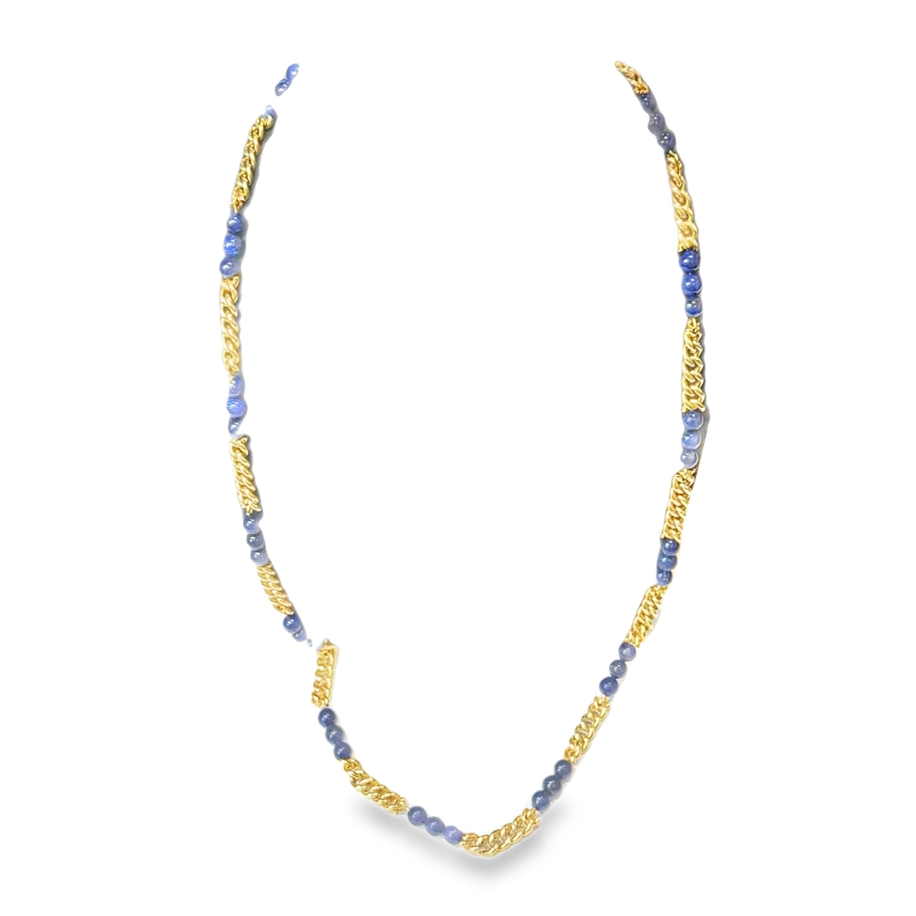 A necklace of serene elegance.

Crafted in 1960 by Van Cleef & Arpels, this chain necklace exudes a modern allure. The deep blue of lapis lazuli beads punctuates the piece, harmonizing with the warm glow of 18k yellow gold links. Each segment is