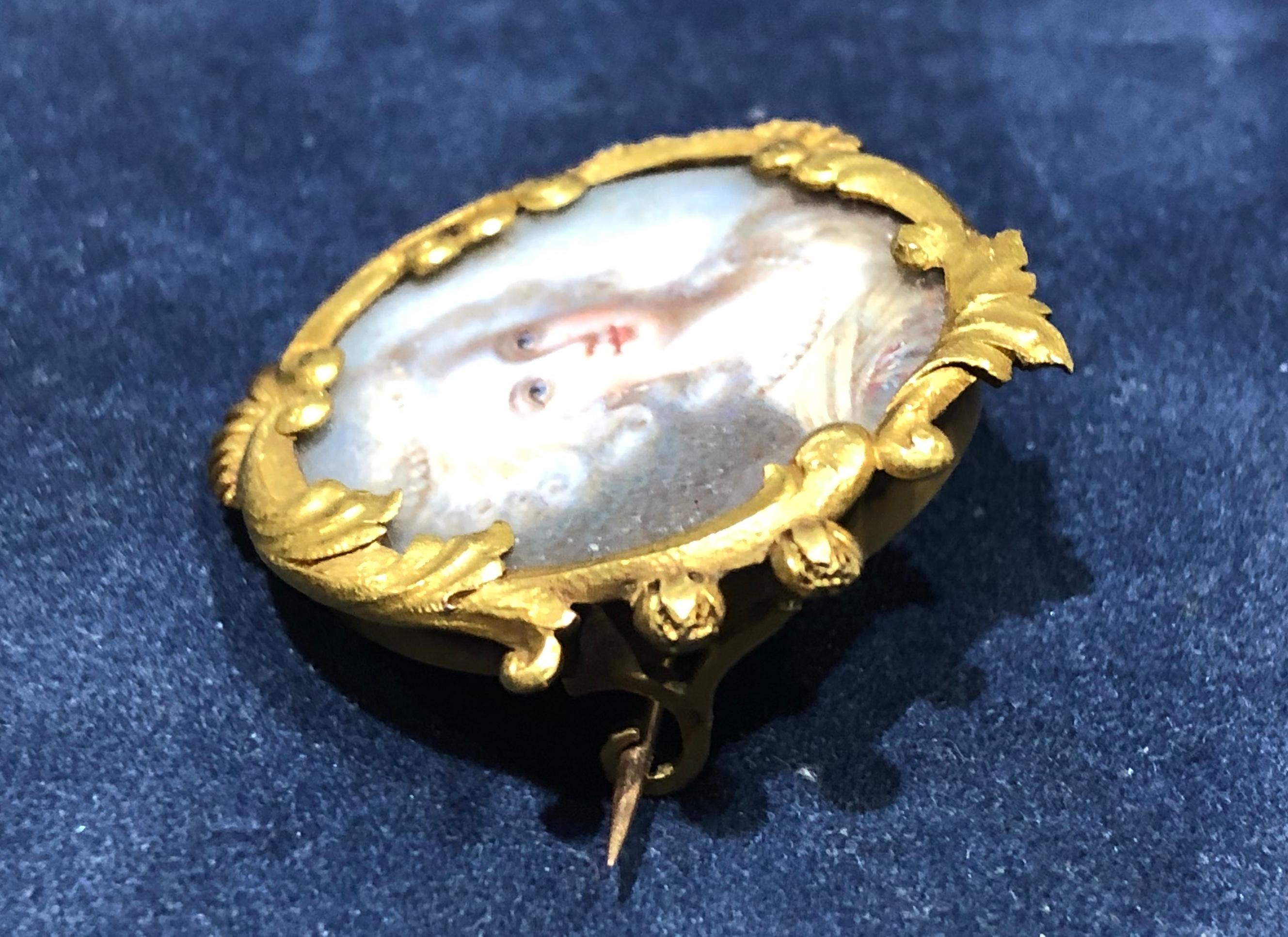 18k Victorian French mother of pearl miniature.  Piece is hallmarked with the eagle shown in the pictures indicating France and purity of 18k.  Measures approximately 1 1/8