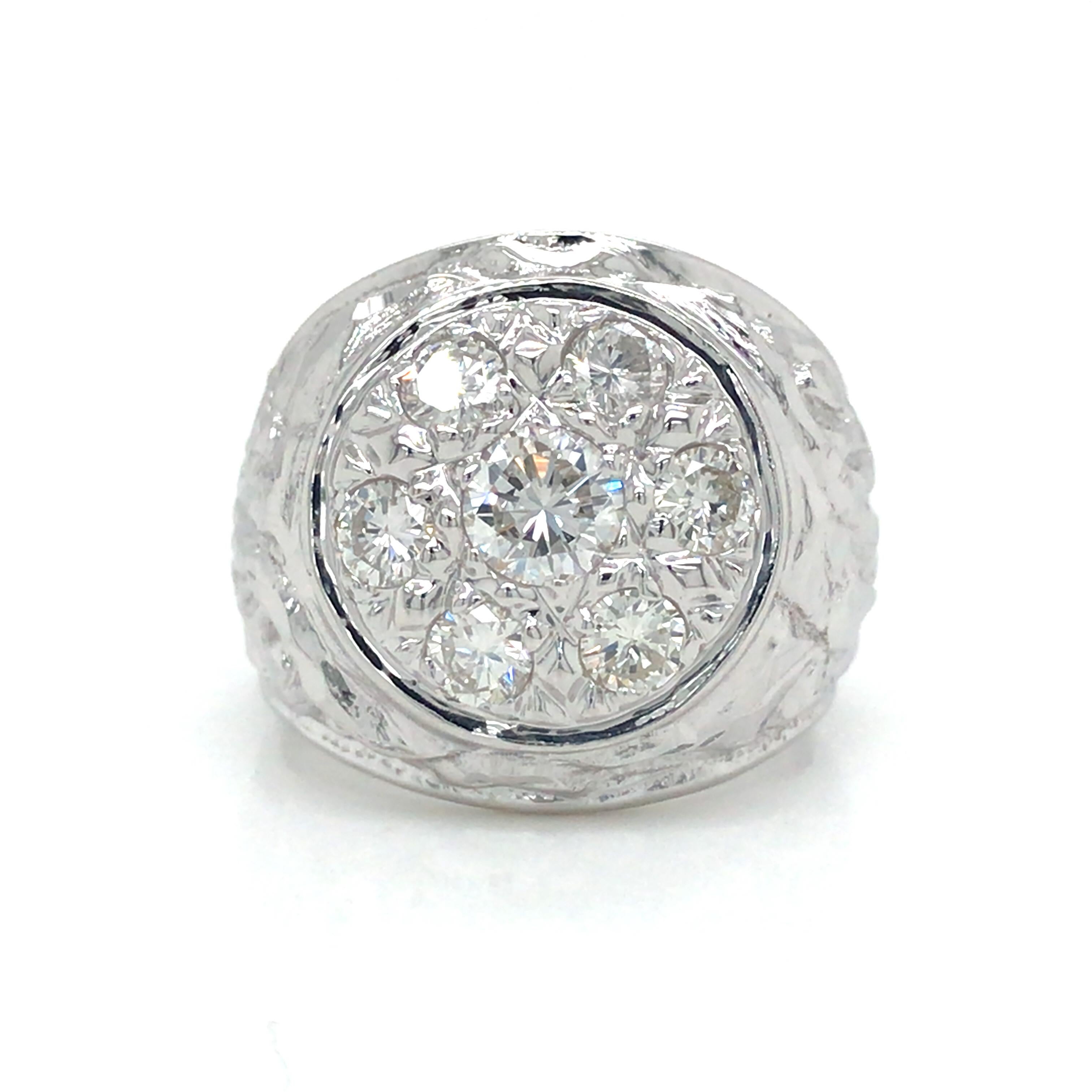 Vintage Diamond Cluster Signet Ring in 18K White Gold.   Round Brilliant Cut Diamonds weighing 1.50 carat total weight, G-H in color and VS in clarity are expertly set.  The Ring measures 3/4 inch in width at the widest point.  Ring size 6 1/2.