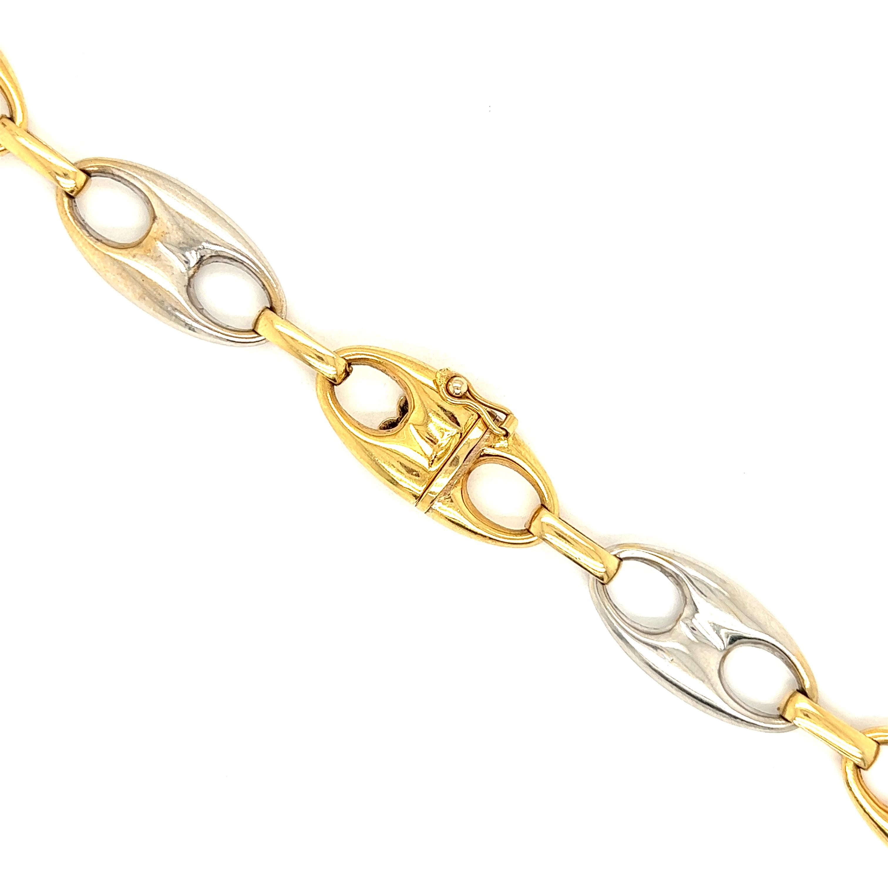 This timeless 18K Vintage White and Yellow Gold Mariner Link Chain 33