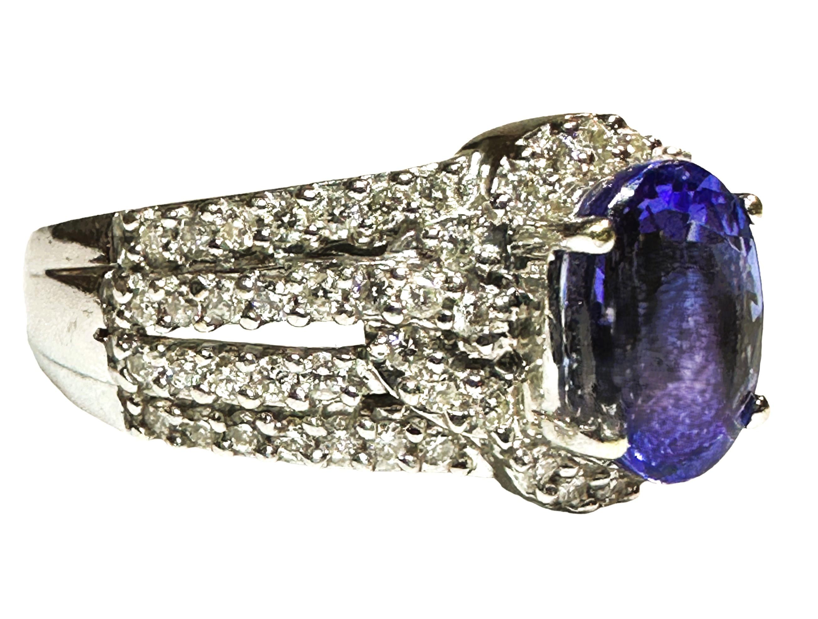 Women's 18K WG 1 Carat Oval Cut Tanzanite Ring with 3/4 CTTW Diamonds with Appraisal For Sale