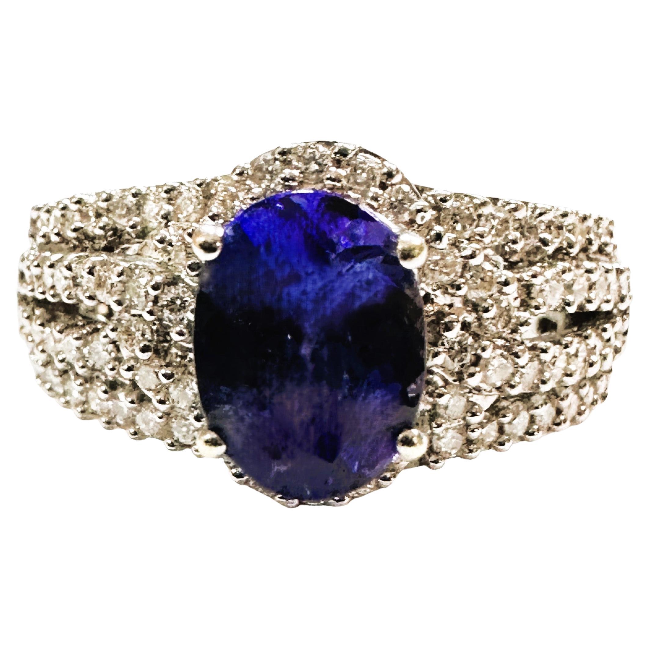 18K WG 1 Carat Oval Cut Tanzanite Ring with 3/4 CTTW Diamonds with Appraisal For Sale