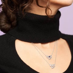 Carelle 18K WG .22 Ct Tanzanite .11 Ct Diamond Florette Pendant